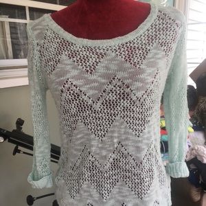 Light sweater size Medium